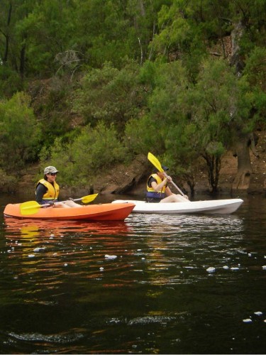 Two Canoeist Floating By