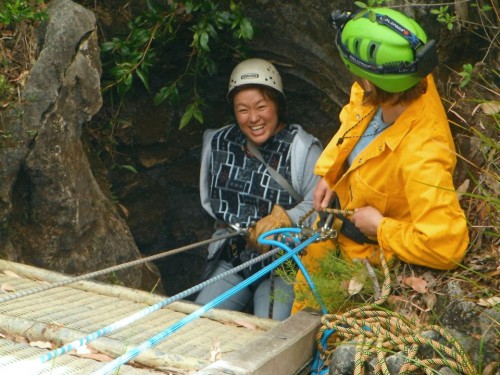 Tomoe stops and smiles