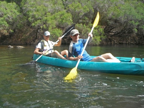 Brian and Nik relax in a tandem kayak
